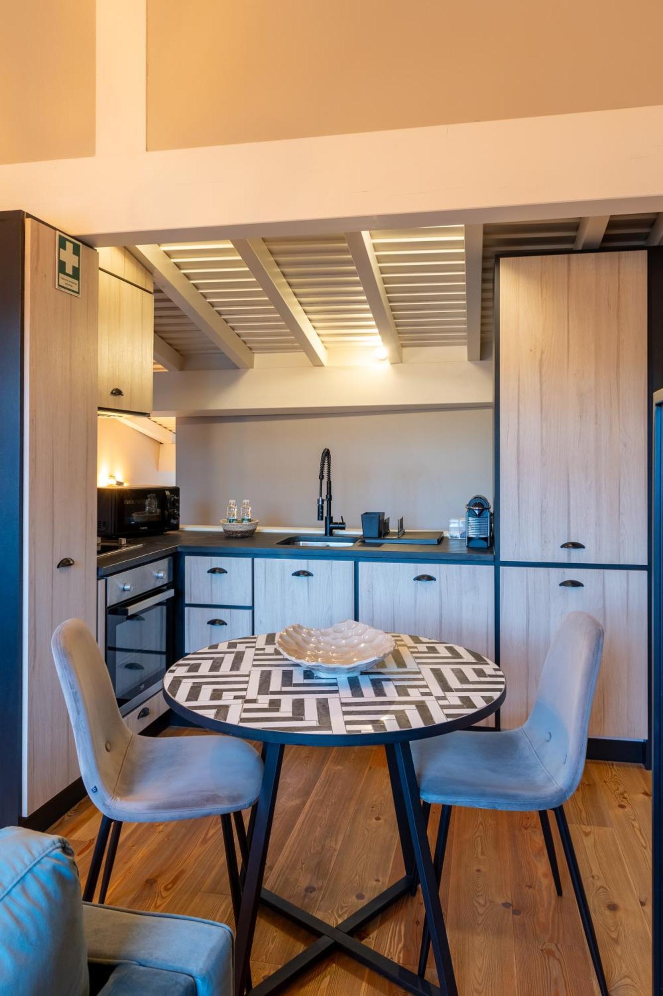 Aparthotel Largo Da Oliveira Guimarães Habitación foto